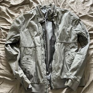 Old grey bomber jacket. Decent condition.